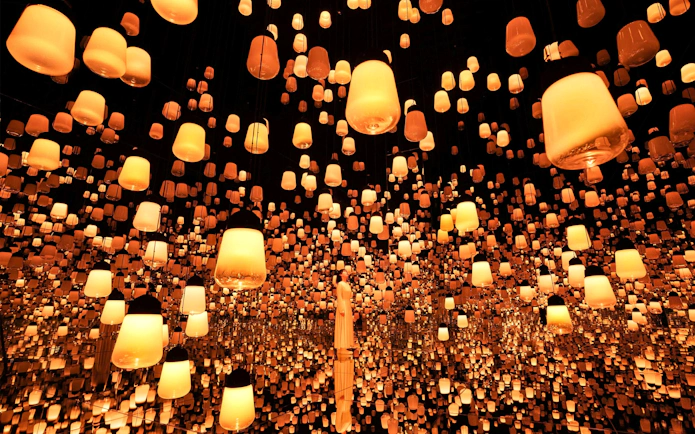Wind chimes and lights installation at teamLab Biovortex Kyoto during Summer Festival.