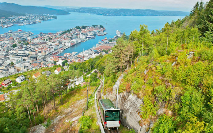 Funicular ascending Mount Floyen with panoramic view of Bergen, Norway.