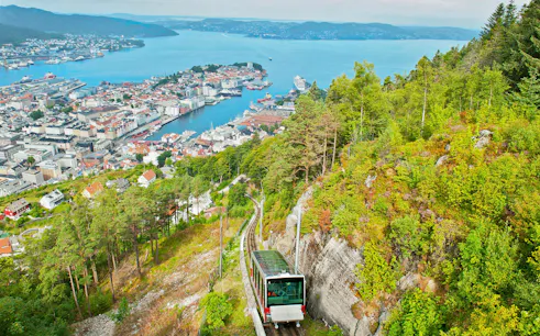 Funicular ascending Mount Floyen with panoramic view of Bergen, Norway.