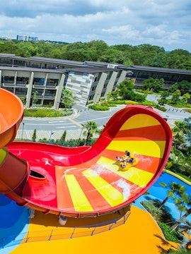 Visitors enjoying a water slide at Wild Wild Wet, Singapore.