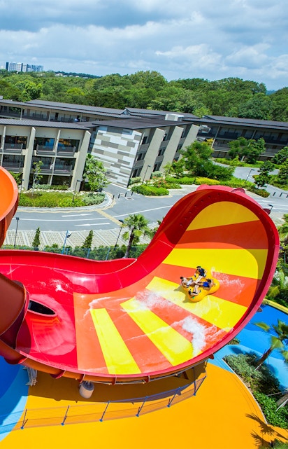 Visitors enjoying a water slide at Wild Wild Wet, Singapore.