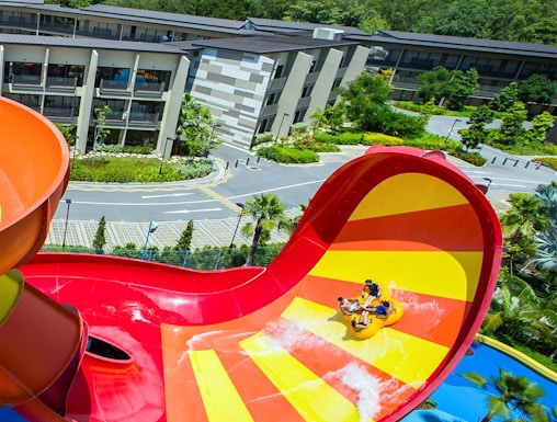 Visitors enjoying a water slide at Wild Wild Wet, Singapore.