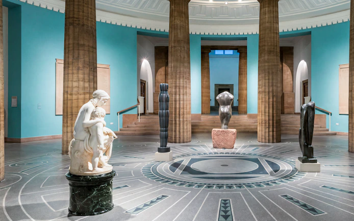 Exhibits inside Hamburger Kunsthalle featuring classical and modern sculptures.