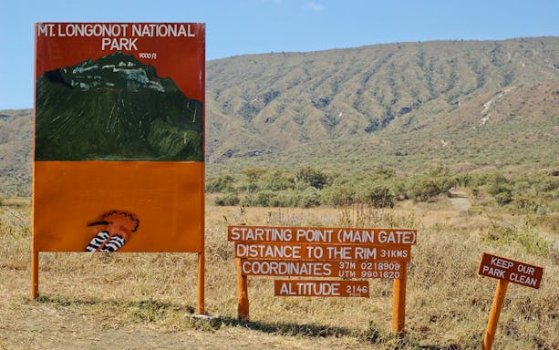 Mount Longonot National Park signpost with trail information, Nairobi, Kenya.