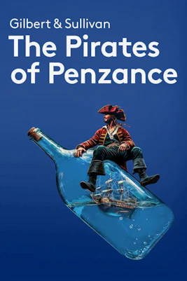 Pirates of Penzance cast performing on stage in vibrant costumes, London theater show.