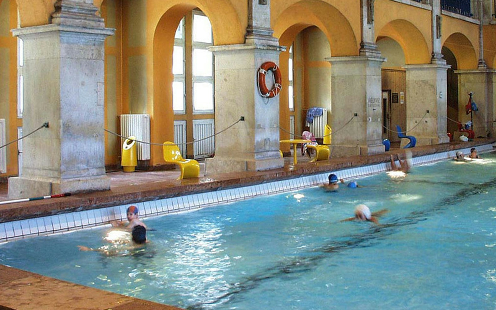 Rudas Bath indoor swimming pool with arched ceilings in Budapest, Hungary.