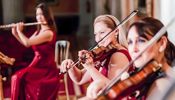 Orchestra performing at concert hall in Tivoli