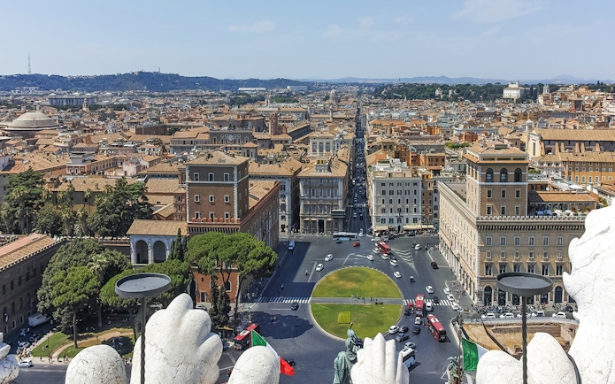 View of Rome from the Altar of the Fatherland, showcasing cityscape and historic buildings.