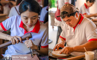 Wood carving artisans at Driftwood Village Hoi An workshop, Hoi An.