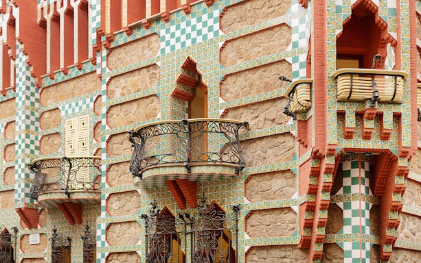 Casa Vicens facade with colorful tiles and ornate balconies in Barcelona.