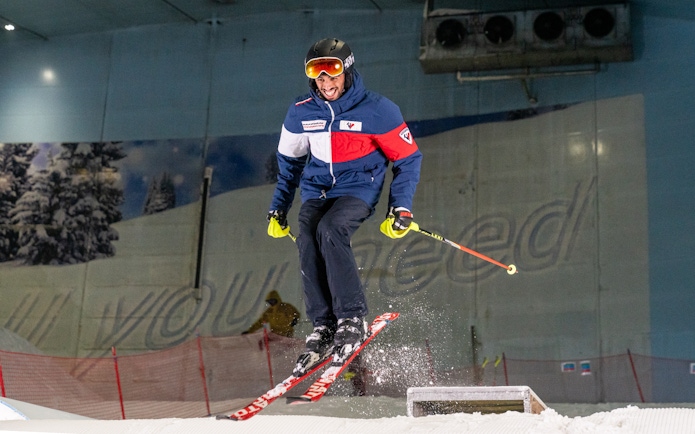 Man skiing indoors at Ski Dubai Slope.