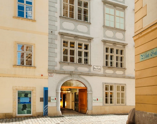 Vienna Big Bus tour passing by historic buildings and landmarks.