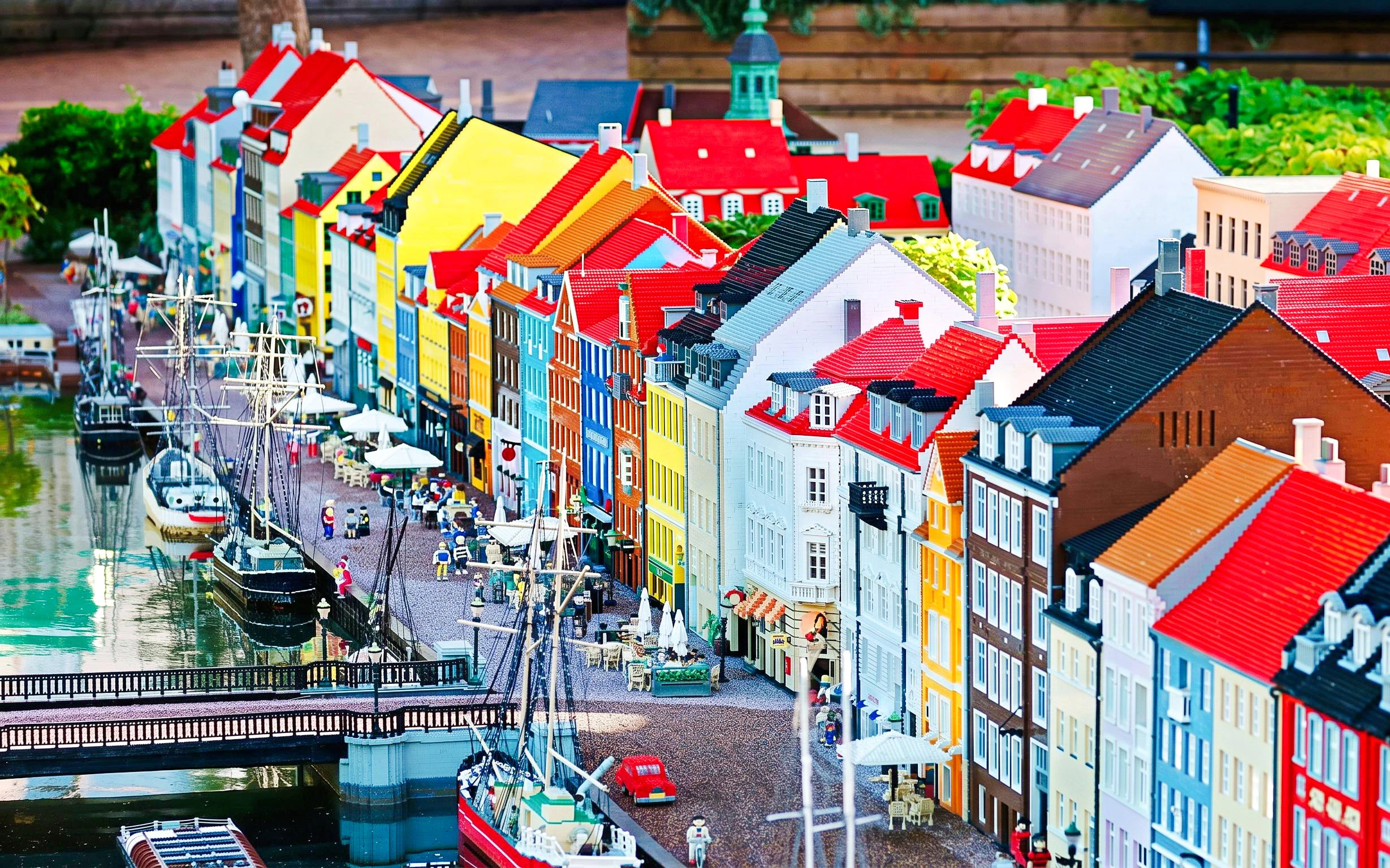 Colorful LEGO buildings and boats in LEGOLAND Miniland.