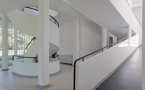 Spiral staircase and ramp inside Villa Savoye, Poissy, France.