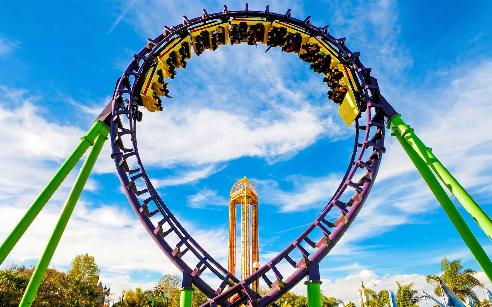 Rollercoaster loop at Six Flags Mexico against a blue sky.