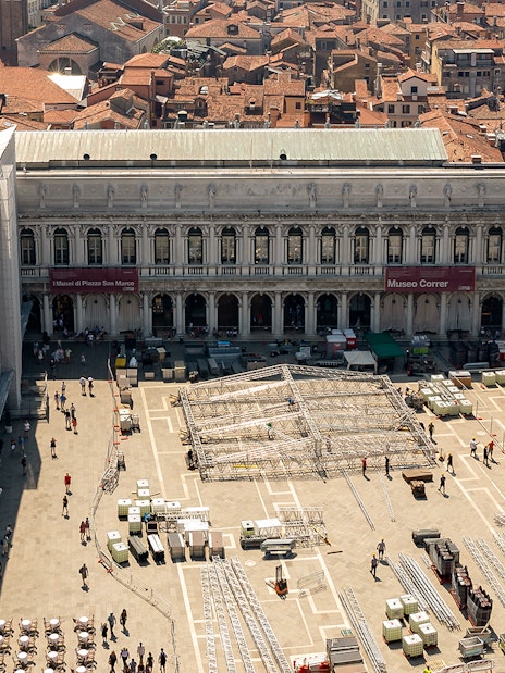 Aerial view of Correr Museum in Venice with people walking in the courtyard.