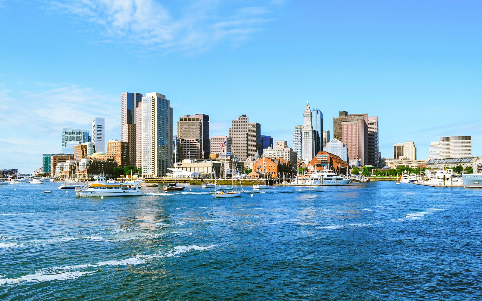 Boston skyline with boats on the harbor, Massachusetts.