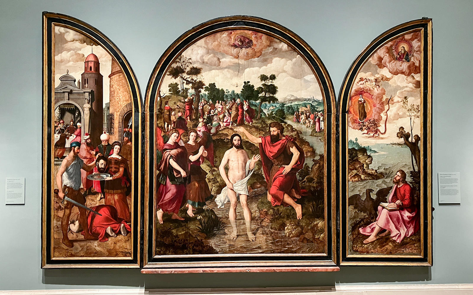 Triptych painting at Prado Museum depicting biblical scenes with figures in historical attire.