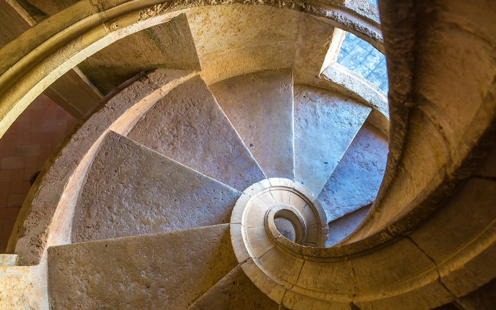 Spiral staircase inside Belém Tower, Lisbon, Portugal.