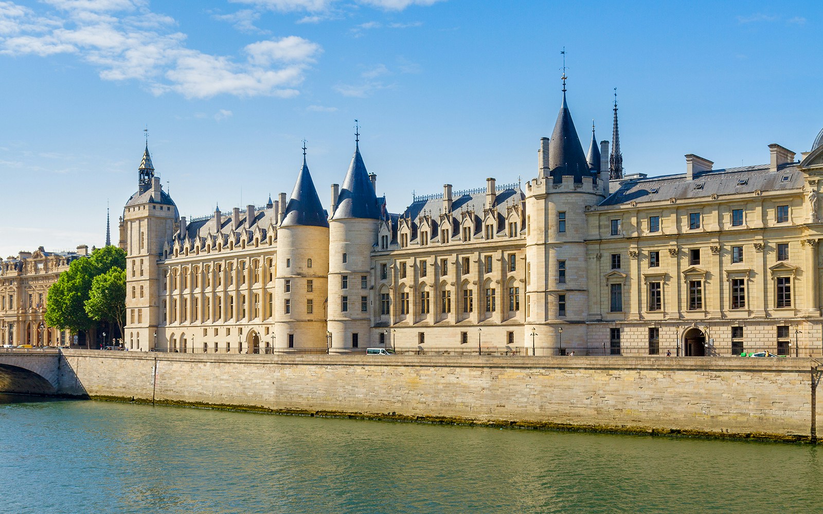 La Conciergerie in Paris with stained glass windows and Gothic architecture.