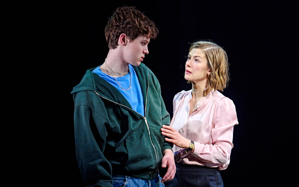 Two actors in a dramatic scene from Inter Alia production.