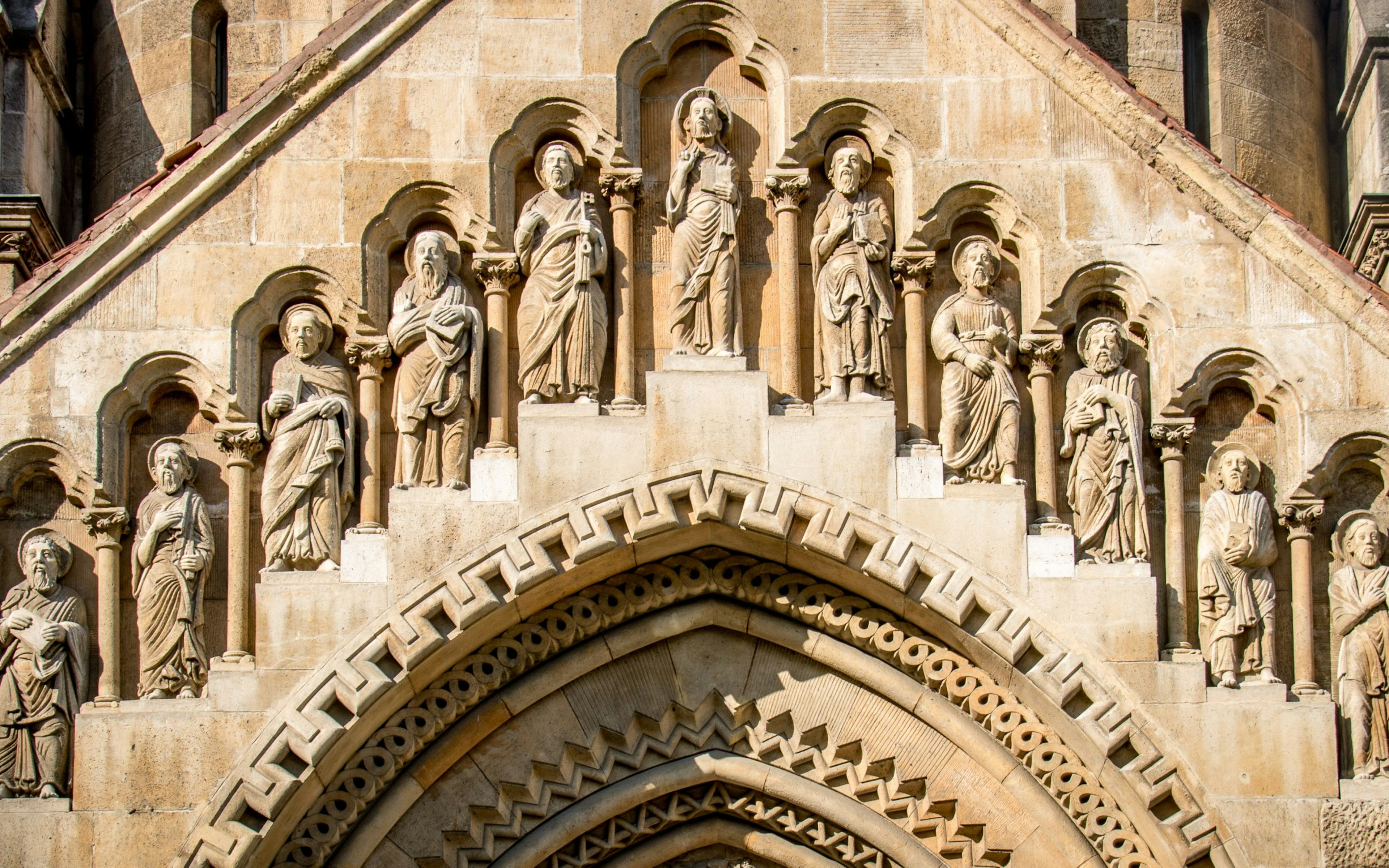Stone carvings on the facade of Ják Church at Vajdahunyad Castle, Budapest, Hungary.