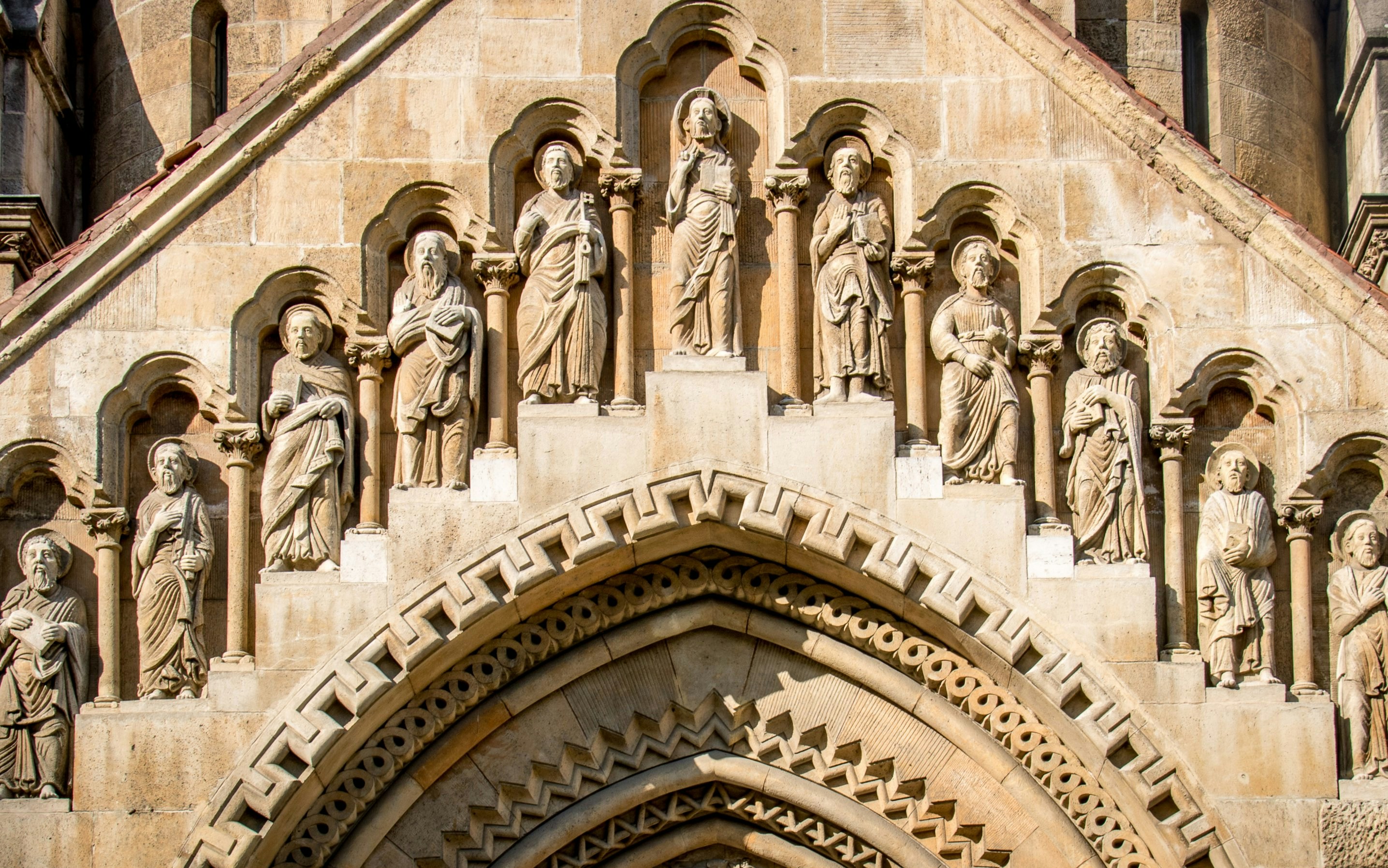 Stone carvings on the facade of Ják Church at Vajdahunyad Castle, Budapest, Hungary.