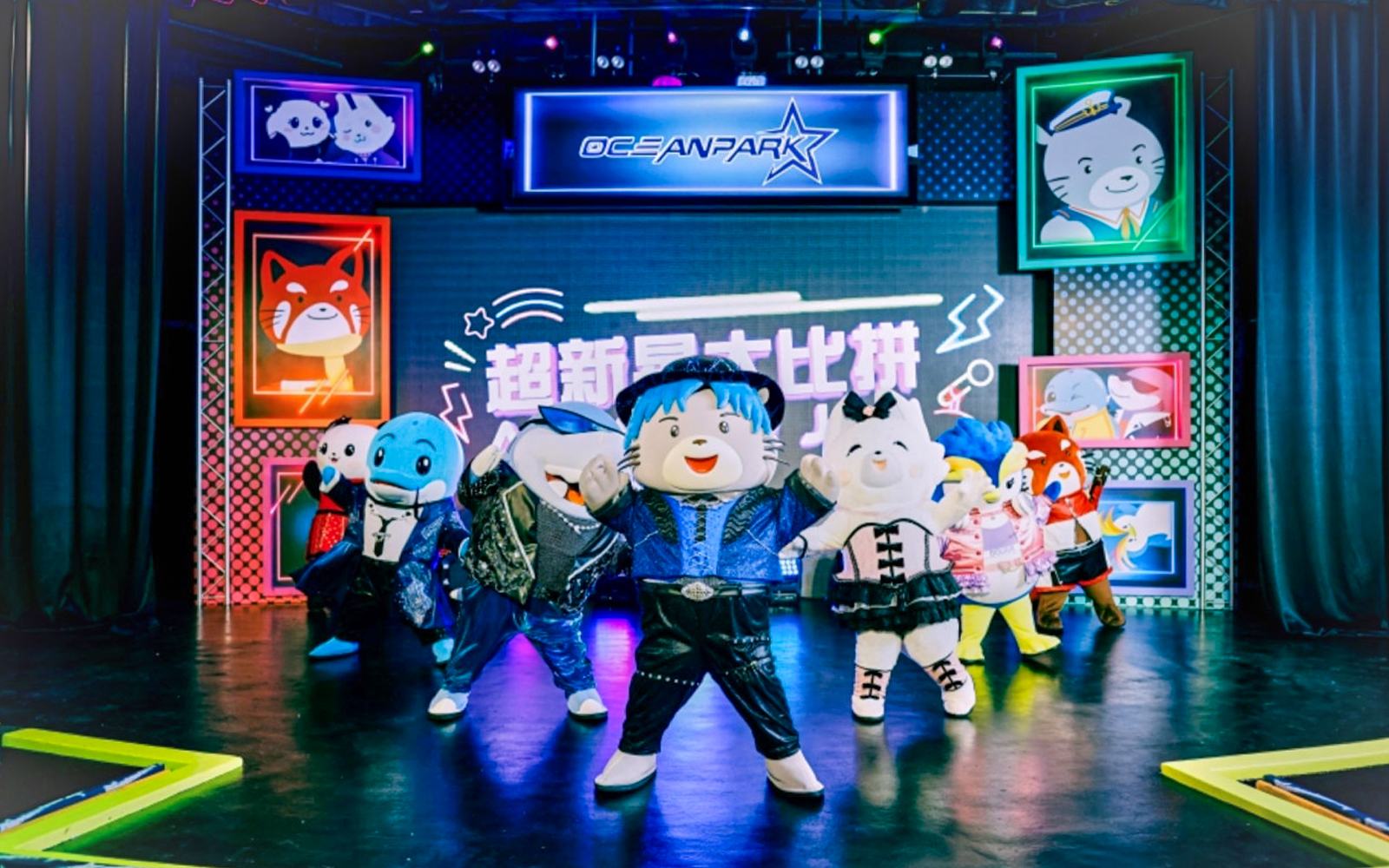 Costumed characters performing on stage at Ocean Park.