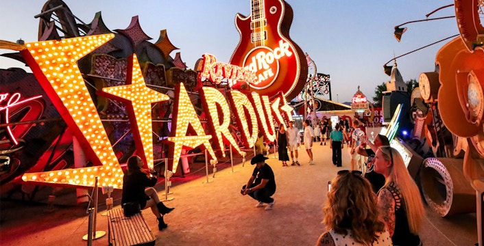 Neon signs and visitors at Neon Museum, Las Vegas.