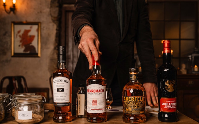 Whisky bottles on display during an underground tasting tour in Edinburgh.