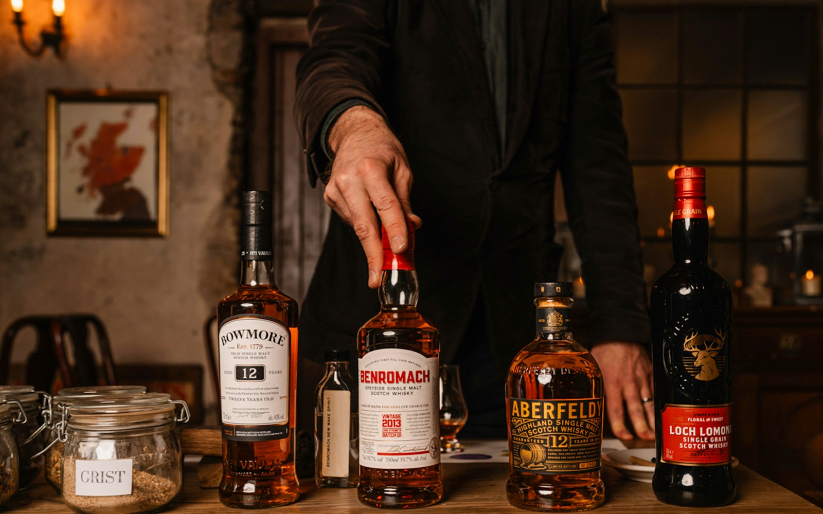 Whisky bottles on display during an underground tasting tour in Edinburgh.