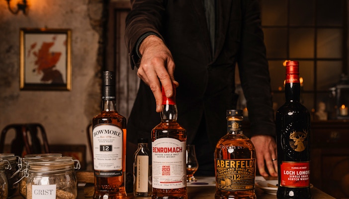 Whisky bottles on display during an underground tasting tour in Edinburgh.