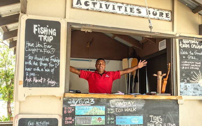 Activities bureau at Mantaray Island Resort, Fiji, offering fishing trips and eco walks.