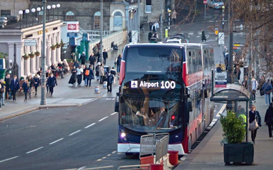 Airport 100 bus at Edinburgh Waverley Station for express transfer to Edinburgh Airport.