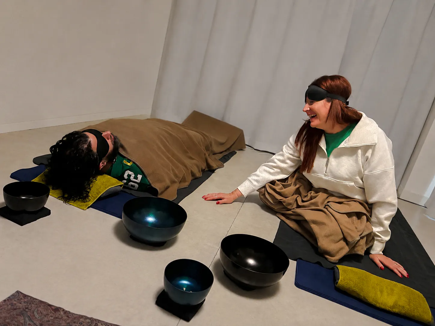 Private Japanese sound bath session with participants in lying-down meditation, Kyoto.