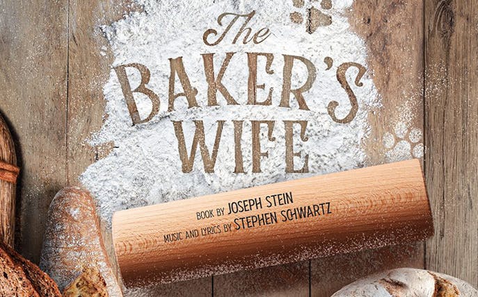 The Baker's Wife musical poster with flour, bread, and rolling pin.