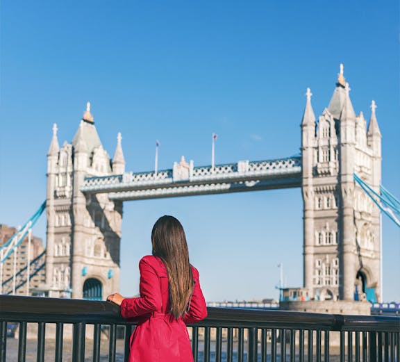 Person admiring Tower Bridge in London.