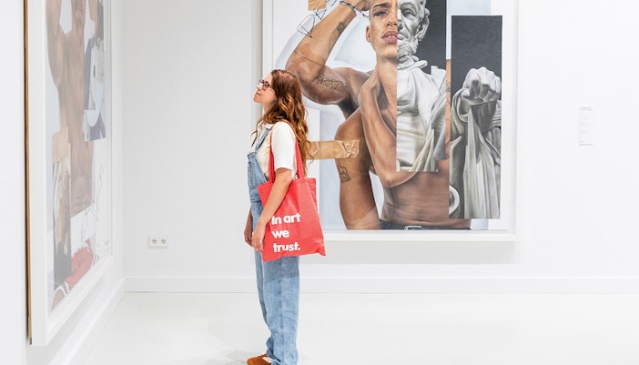 Visitors viewing Robin Kid The Future is old artwork at Moco Museum in Barcelona, entry tickets available for exclusive access