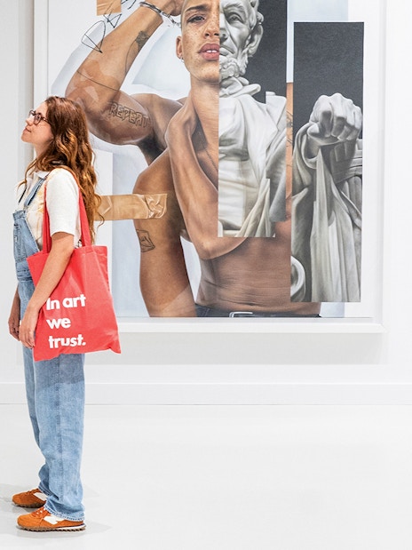 Visitor viewing Robin Kid artwork at Moco Museum, Barcelona.
