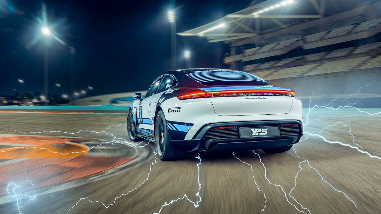 Porsche Taycan Turbo on track at Yas Marina Circuit, night driving experience.