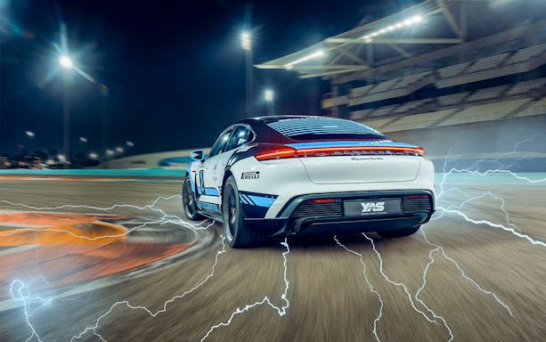 Porsche Taycan Turbo on track at Yas Marina Circuit, night driving experience.
