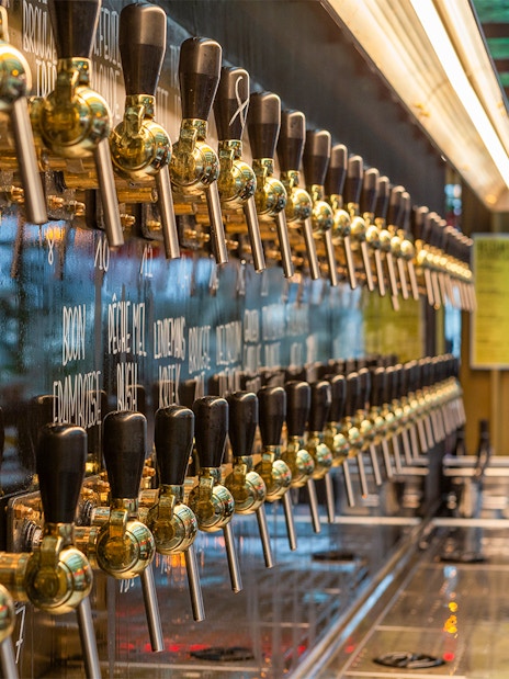 Beer taps lined up for tasting at a Brussels brewery.