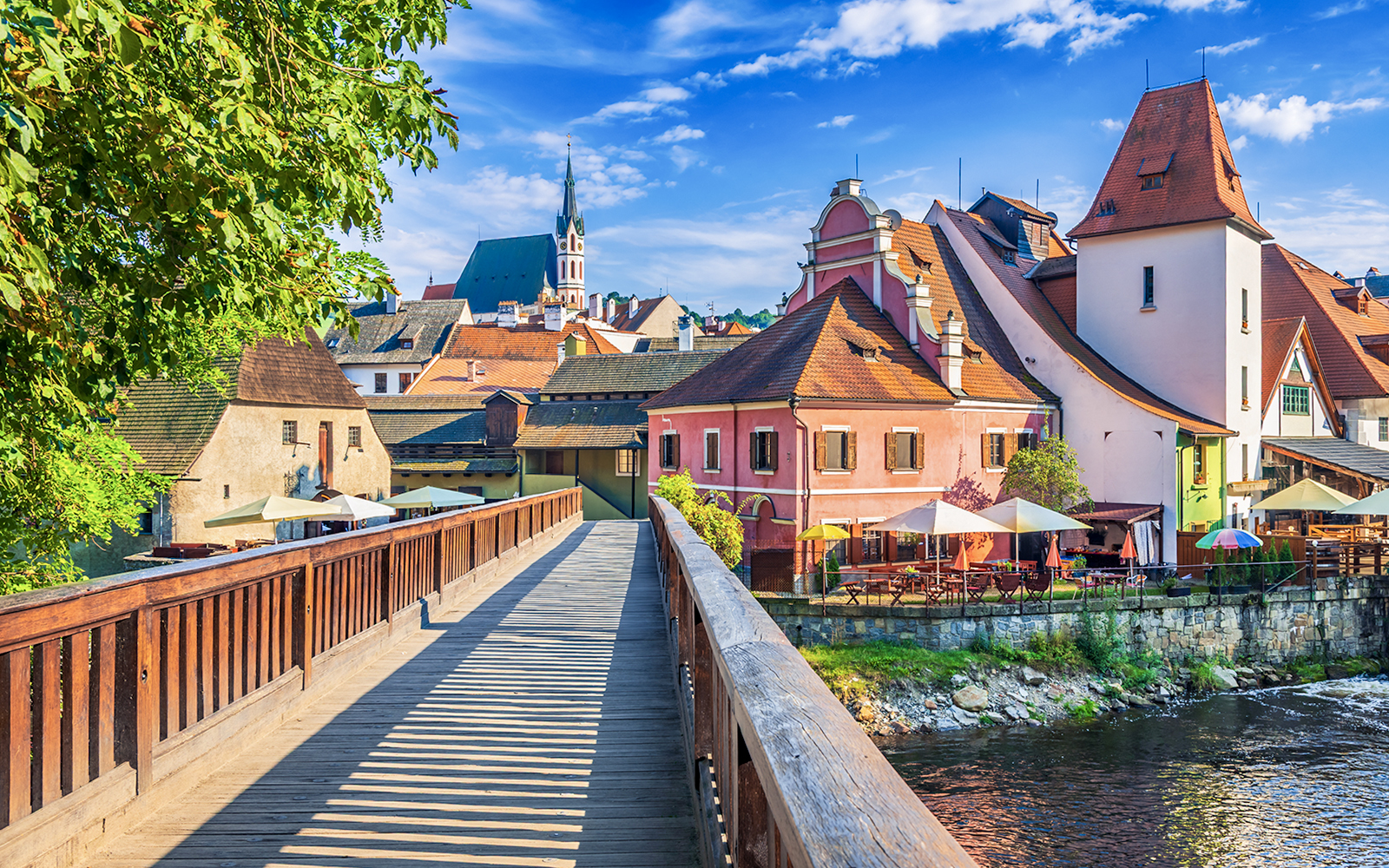 Cesky Krumlov view with colorful buildings and river during one day trip from Prague.