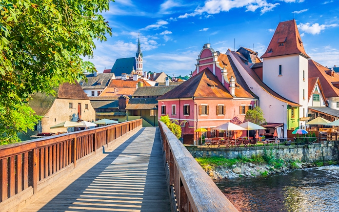 Cesky Krumlov view with colorful buildings and river during one day trip from Prague.