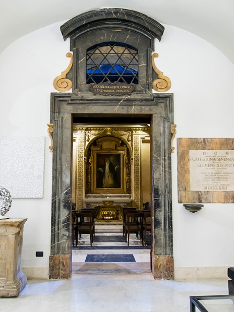 Entrance to concert hall for Great Opera Arias in Rome, featuring ornate interior and seating.