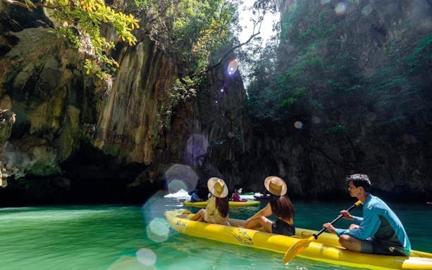 Canoeing through limestone caves in Phang Nga Bay on John Gray's Sea Canoe tour from Phuket.