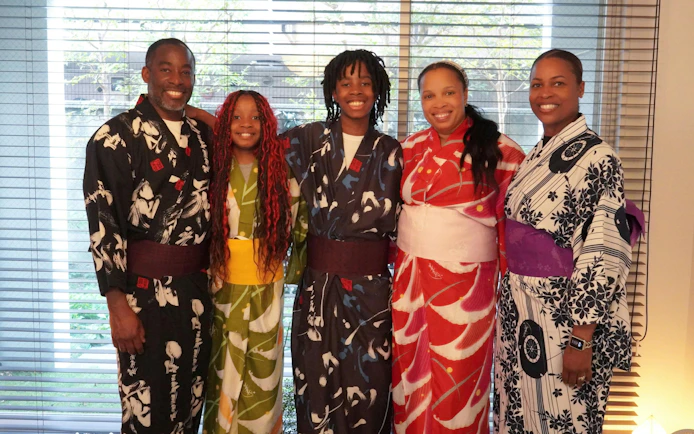 Group wearing kimonos during a tea ceremony experience in Tokyo.