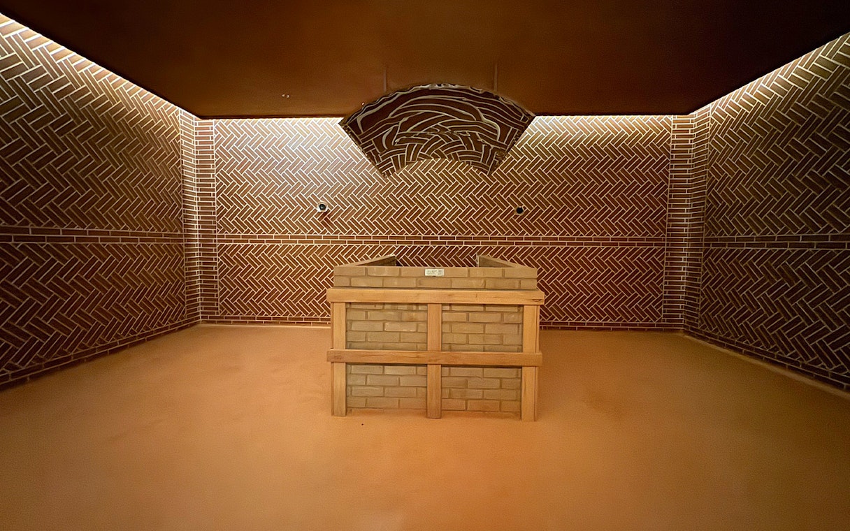 Aqua field sauna interior at VinPearl Harbour, Nha Trang, Vietnam with brick design.