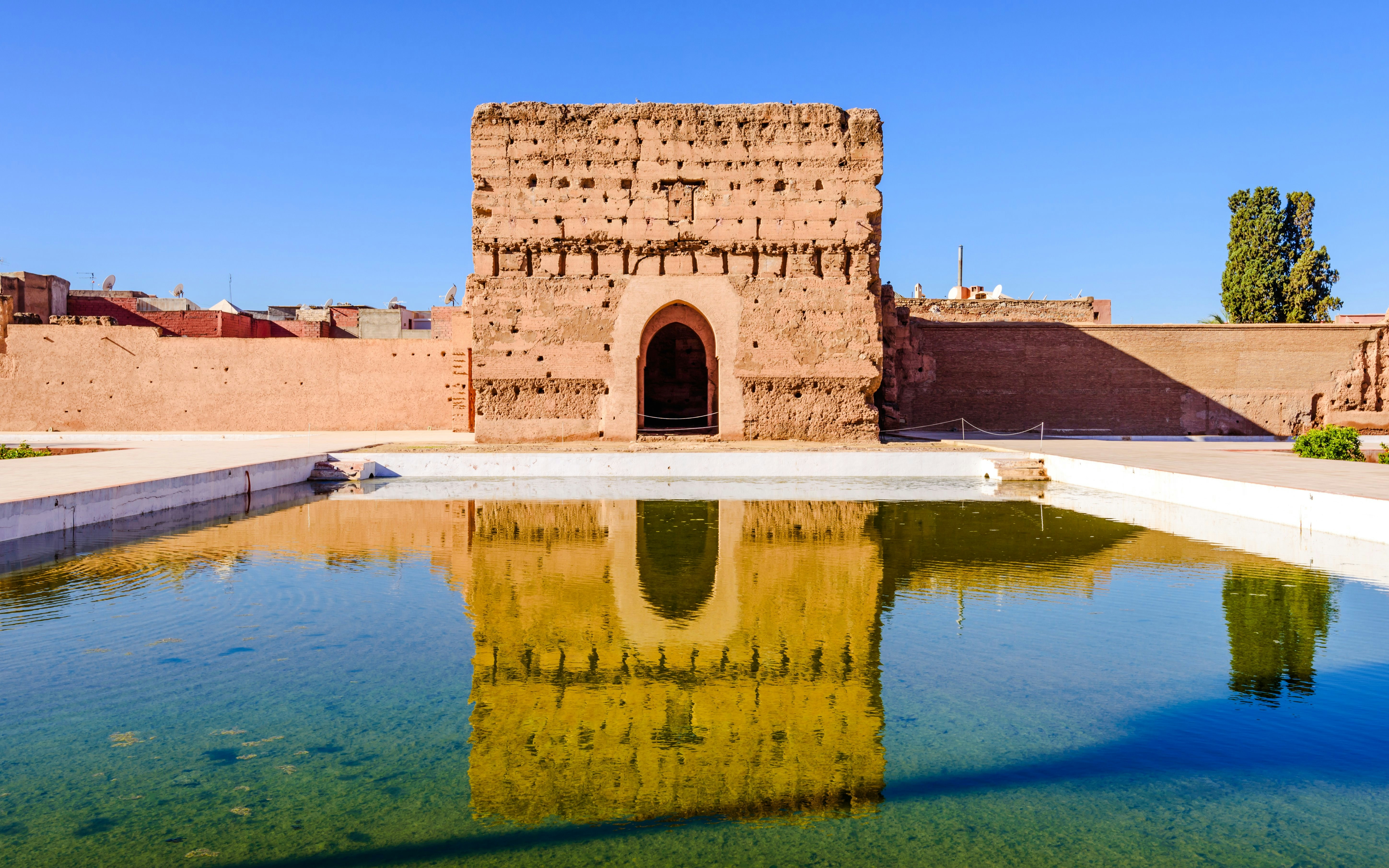 El Badi Palace ruins with reflection in water, Marrakech.
