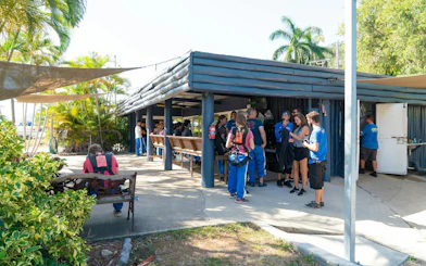 Visitors preparing for tandem skydive at Airlie Beach facility.